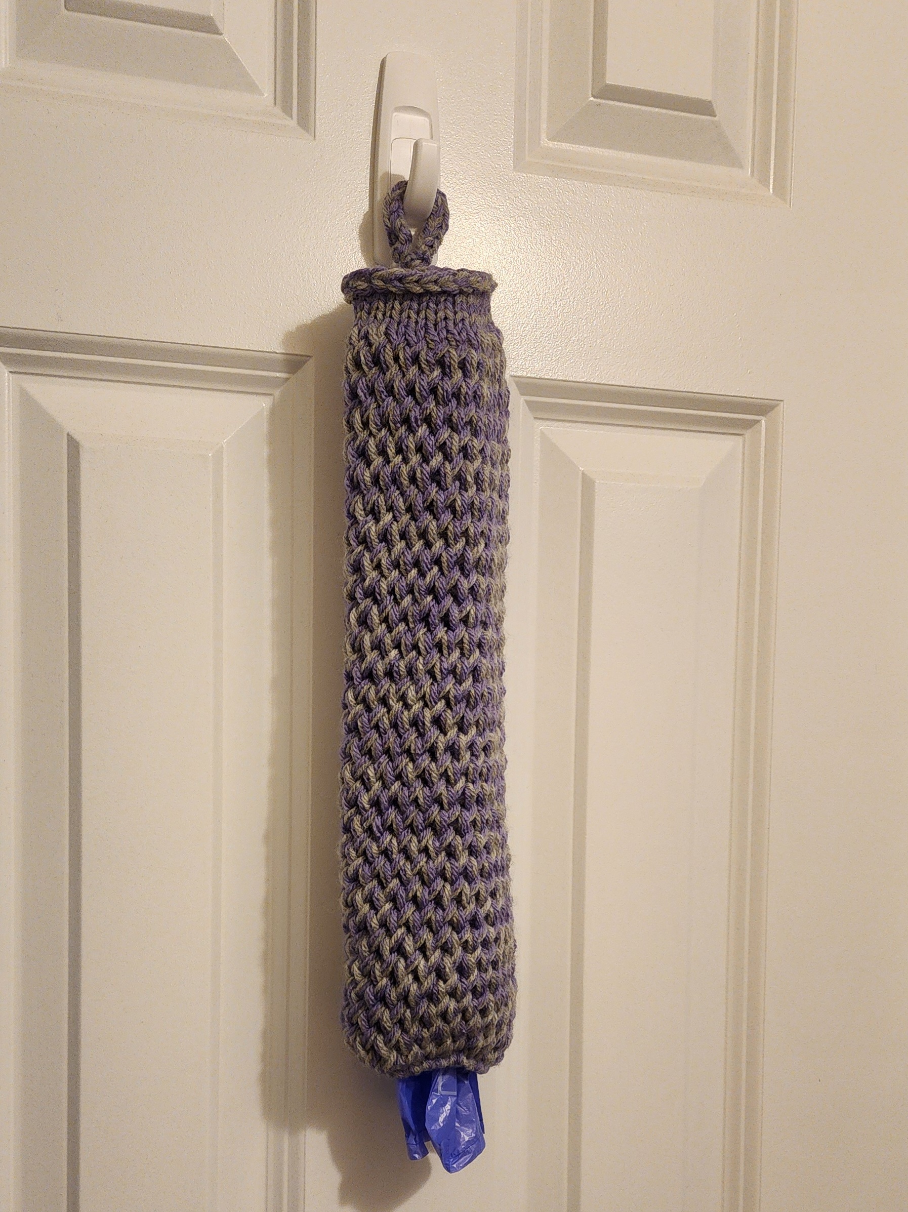 A purple and gray crochet bag dispenser handmade by Bella Faith Designs.